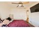 Bedroom featuring a ceiling fan, storage, and natural light at 1065 Admiral Emblem St, Henderson, NV 89015