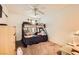 Cozy bedroom featuring a bunk bed, dresser, and ceiling fan at 1065 Admiral Emblem St, Henderson, NV 89015