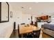 Open dining area with wood table, seating for six, and view into the kitchen at 1065 Admiral Emblem St, Henderson, NV 89015