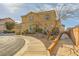 Two-story home with desert landscaping, walkway, and a welcoming covered porch at 1065 Admiral Emblem St, Henderson, NV 89015