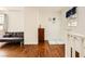 Living room with hard wood floors and a gray couch at 1065 Admiral Emblem St, Henderson, NV 89015