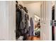 Walk-in closet, well-organized with storage solutions and natural light at 1065 Admiral Emblem St, Henderson, NV 89015