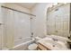 Bathroom featuring a tub with a shower, vanity, toilet, and a mirror at 4960 Harrison Dr # 214, Las Vegas, NV 89120