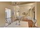 Bright dining area with hardwood floors and living room view at 9833 Villa Ridge Dr, Las Vegas, NV 89134