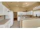 Modern kitchen with white cabinets and ample counter space at 9833 Villa Ridge Dr, Las Vegas, NV 89134