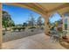 Relaxing patio with seating area overlooking a golf course at 9833 Villa Ridge Dr, Las Vegas, NV 89134