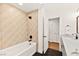 Bathroom with geometric tile, soaking tub, and modern fixtures at 2501 Wimbledon Dr, Las Vegas, NV 89107