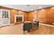 Living room with wood paneled walls and fireplace at 2501 Wimbledon Dr, Las Vegas, NV 89107