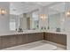 Modern double vanity bathroom with large mirrors at 1841 Newport Bay Dr, Las Vegas, NV 89117