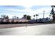 Outdoor parking area with several RVs and boats parked on a gravel lot at 2678 Aracatuba Ave, Las Vegas, NV 89121