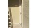 A well-lit apartment entrance featuring the unit number and the front door at 5317 Indian River Dr # 295, Las Vegas, NV 89103