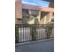 View from a cozy balcony overlooking a lush landscape and a well-maintained building facade at 5317 Indian River Dr # 295, Las Vegas, NV 89103