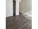 Bedroom with wood-look flooring and closet area at 5317 Indian River Dr # 295, Las Vegas, NV 89103