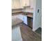 A kitchen featuring stainless steel appliances, countertops, and modern white cabinetry at 5317 Indian River Dr # 295, Las Vegas, NV 89103