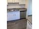 Kitchen area boasts stainless steel dishwasher and granite countertops at 5317 Indian River Dr # 295, Las Vegas, NV 89103
