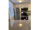 Well-lit kitchen features stainless steel appliances and granite countertops at 5317 Indian River Dr # 295, Las Vegas, NV 89103