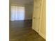 Living room featuring hardwood floors, natural lighting and neutral colored walls at 5317 Indian River Dr # 295, Las Vegas, NV 89103