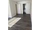 Bright main bedroom boasting gray flooring, neutral walls, and an ensuite bathroom at 5317 Indian River Dr # 295, Las Vegas, NV 89103