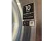 Close-up of a Samsung refrigerator showcasing a 10-year warranty on the compressor with digital inverter technology at 2801 Willow Wind Ct, Las Vegas, NV 89117