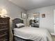 Cozy bedroom with a double bed and mirrored closet doors at 2801 Willow Wind Ct, Las Vegas, NV 89117