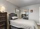 Cozy bedroom with a comfortable bed and mirrored closet doors at 2801 Willow Wind Ct, Las Vegas, NV 89117