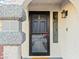 Modern black front door with glass inset at 2801 Willow Wind Ct, Las Vegas, NV 89117