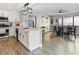 Open concept kitchen and dining area with modern appliances at 2801 Willow Wind Ct, Las Vegas, NV 89117