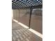Covered patio with adjustable privacy screen offers a relaxing space at 2801 Willow Wind Ct, Las Vegas, NV 89117