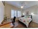 Cozy bedroom with plantation shutters and a ceiling fan for added comfort at 1950 Colvin Run Dr, Henderson, NV 89052