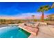 Gorgeous pool with a built-in spa and a panoramic view of the surrounding community at 1950 Colvin Run Dr, Henderson, NV 89052