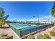 Well-maintained tennis and pickleball courts surrounded by lush greenery, offering an active lifestyle at 1950 Colvin Run Dr, Henderson, NV 89052