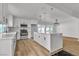 Modern updated kitchen featuring an island, white cabinets and stainless steel appliances at 2606 Vegas Valley Dr, Las Vegas, NV 89121