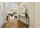 Stylish foyer leading to living spaces with contemporary console table and a view to the rear at 11280 Granite Ridge Dr # 1075, Las Vegas, NV 89135