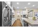 Modern kitchen with a stainless steel refrigerator and stylish countertop details at 11280 Granite Ridge Dr # 1075, Las Vegas, NV 89135