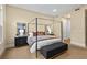 Stylized Main bedroom with a four-poster bed and coordinated decor at 11280 Granite Ridge Dr # 1075, Las Vegas, NV 89135