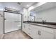 Modern bathroom with double vanity and shower at 2667 Kindswood St, Henderson, NV 89044