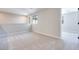 Spacious loft area with neutral carpeting and window at 2667 Kindswood St, Henderson, NV 89044