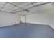 Spacious garage with epoxy floor and storage at 512 Purcell Dr, Las Vegas, NV 89107