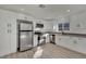 Modern kitchen featuring stainless steel appliances and white cabinetry at 512 Purcell Dr, Las Vegas, NV 89107