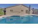 Relaxing pool area with house view at 512 Purcell Dr, Las Vegas, NV 89107