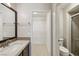 Bathroom with vanity, sink, and walk-in shower at 3125 N Buffalo Dr # 1133, Las Vegas, NV 89128