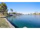 Calm lake view with homes in background at 3125 N Buffalo Dr # 1133, Las Vegas, NV 89128