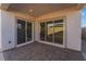 Brick paved patio with sliding glass doors leading inside at 10232 Meandering Dell Ave, Las Vegas, NV 89166