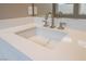 Modern bathroom sink with quartz countertop and sleek faucet at 10232 Meandering Dell Ave, Las Vegas, NV 89166