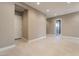 Light and airy hallway with tile floors at 10232 Meandering Dell Ave, Las Vegas, NV 89166