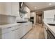 Modern kitchen with gas cooktop and built-in oven at 10232 Meandering Dell Ave, Las Vegas, NV 89166