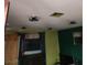 Room with multiple ceiling fans and a dark green wall at 1708 Weeping Willow Ln, Las Vegas, NV 89104