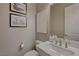 Elegant powder room with contemporary vanity and fixtures at 6411 Wild Blue Ct, Las Vegas, NV 89135