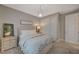 Guest bedroom with sliding door to closet and neutral decor at 6411 Wild Blue Ct, Las Vegas, NV 89135