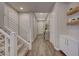 Stylish entryway with wood-look tile floor and built-in shelving at 6411 Wild Blue Ct, Las Vegas, NV 89135